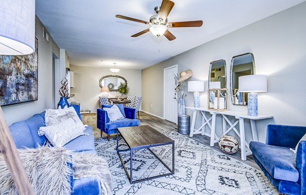 Spacious living room with modern decor and large windows at HUE97 Apartments