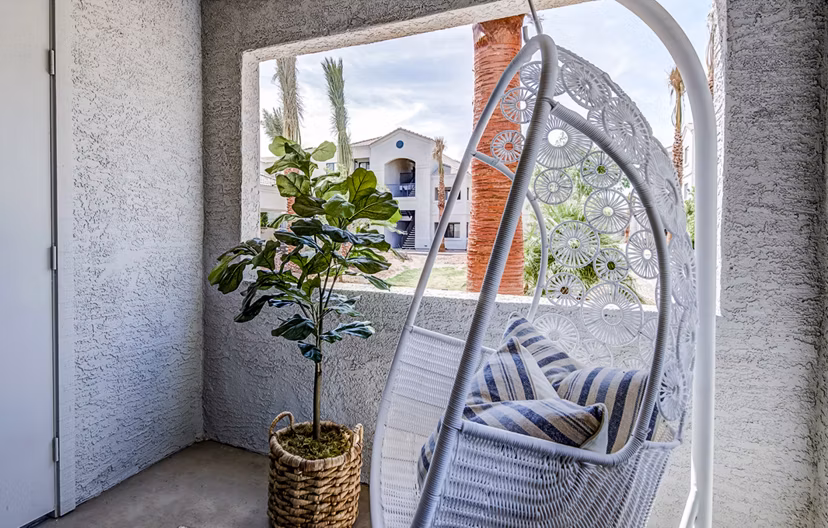 Chic balcony with stylish lounge furniture at HUE97 Apartments