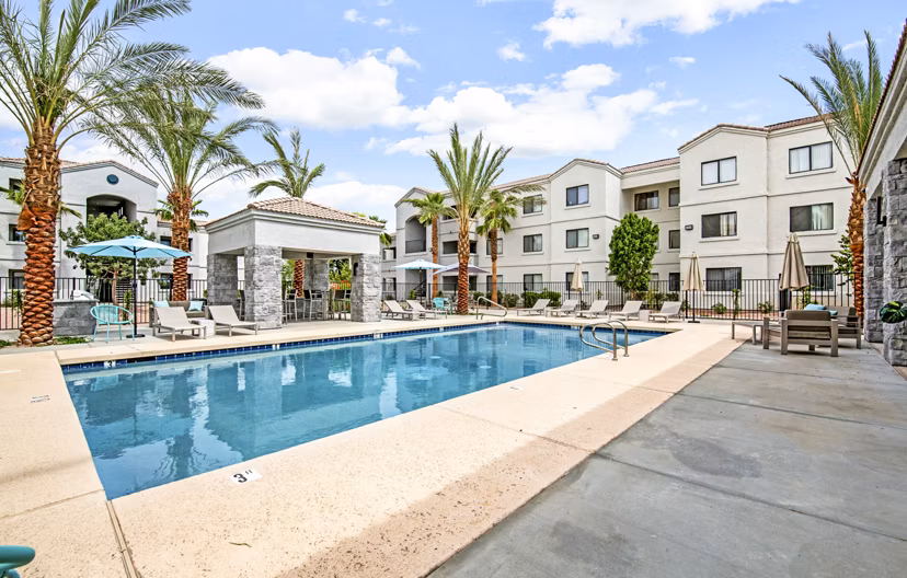 Modern pool area at HUE97 Apartments offering luxury outdoor relaxation spaces
