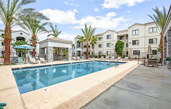 Modern pool area at HUE97 Apartments offering luxury outdoor relaxation spaces