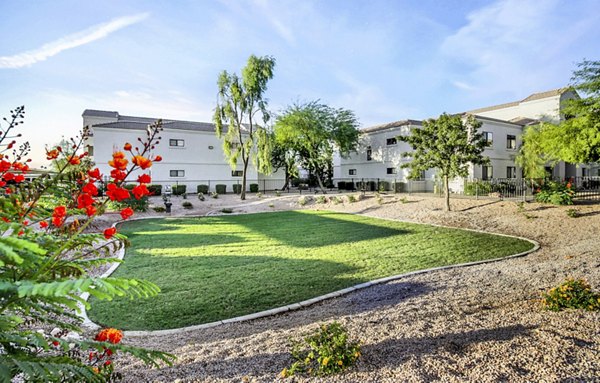 Dog park with agility equipment at HUE97 Apartments, a luxury Greystar community