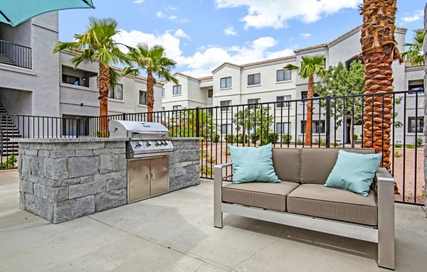 Grill area with modern seating at HUE97 Apartments, Greystar luxury apartments