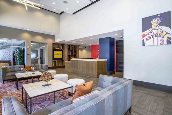 Clubhouse featuring modern dÃ©cor and seating areas at SoDo on Main North Apartments