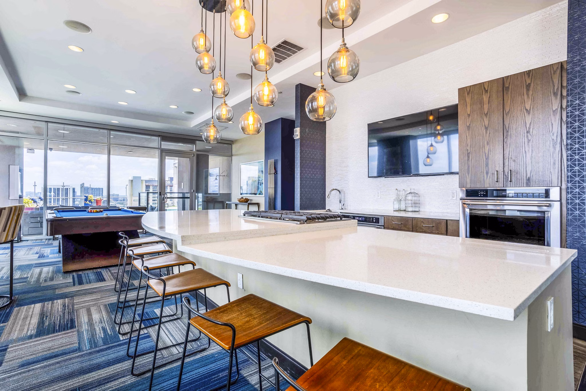 Clubhouse with modern design at SoDo on Main North Apartments featuring luxury amenities