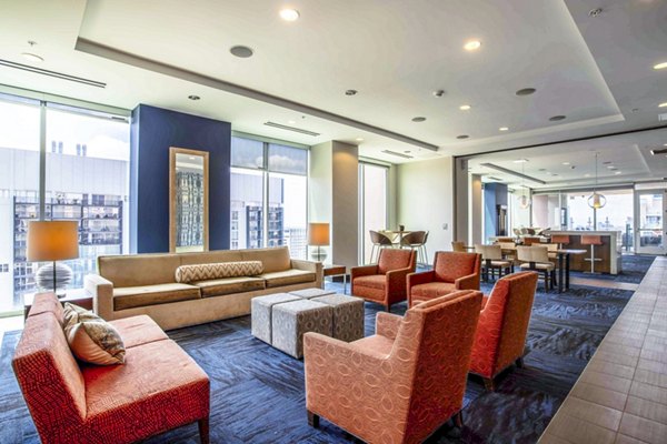 Clubhouse featuring modern decor and lounging areas at SoDo on Main North Apartments