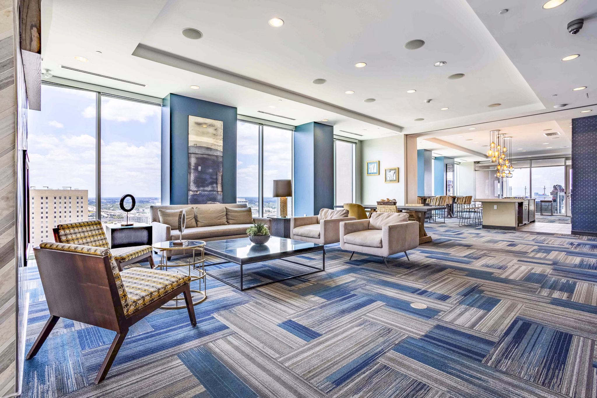 Clubhouse featuring modern design and seating at SoDo on Main North Apartments