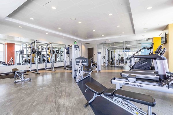 Modern fitness center with state-of-the-art equipment at SoDo on Main North Apartments