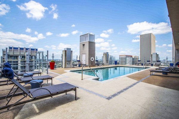 Relaxing outdoor pool area at SoDo on Main North Apartments offering luxury leisure space