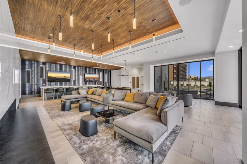 Stylish clubhouse with modern furnishings at Kurve Apartments