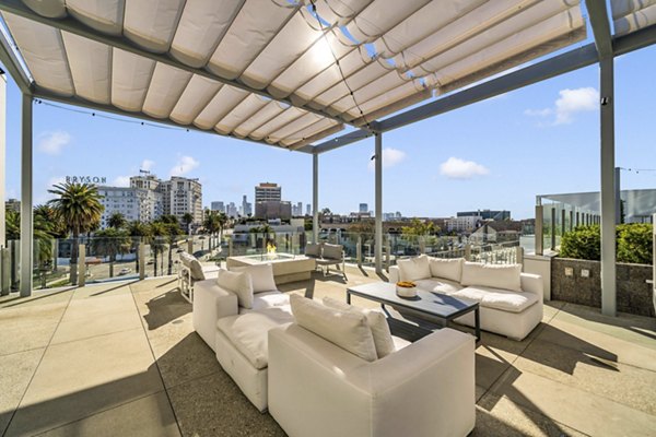 Spacious patio with modern seating at Kurve Apartments offering luxury living in the heart of the city