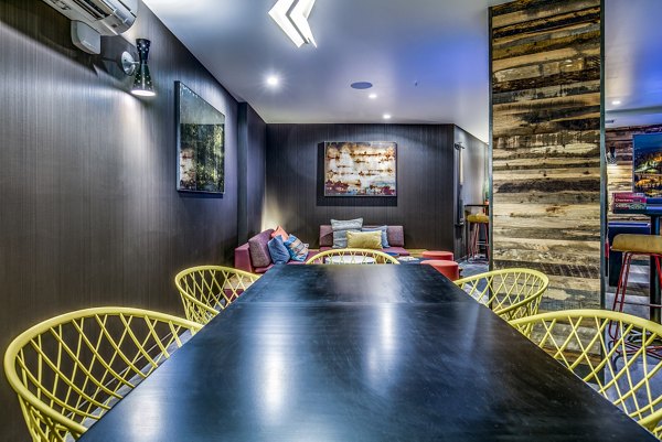 Meeting room equipped for conferences at Batik Apartments with modern seating and technology for high-quality presentations