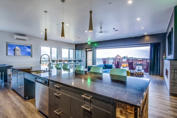 Stylish clubhouse with outdoor patio and game room at Batik Apartments