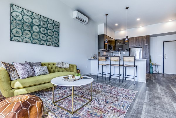 Spacious living room with modern decor in Batik Apartments offering luxury living experiences