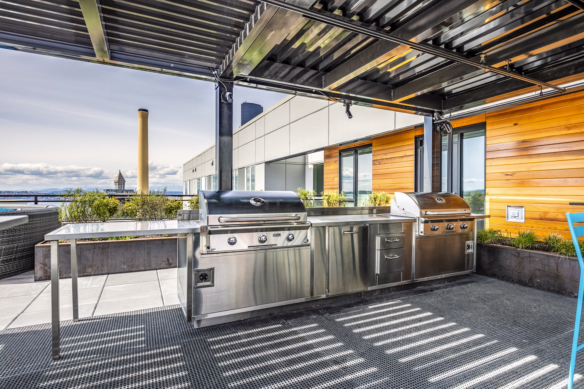 Batik Apartments: Modern luxury apartments with a sleek glass facade in vibrant downtown Seattle neighborhood