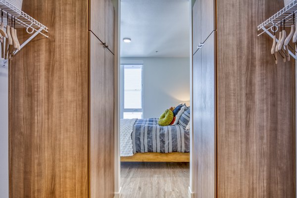 Spacious bedroom closet with built-in shelving at Cypress Apartments