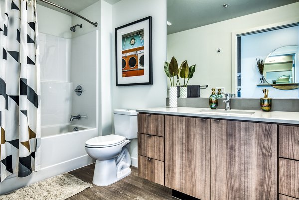 Luxurious bathroom with elegant fixtures at Cypress Apartments