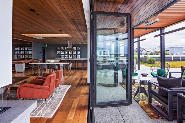 Clubhouse featuring modern design and social spaces in Cypress Apartments, ideal for meetings and gatherings in a luxury setting