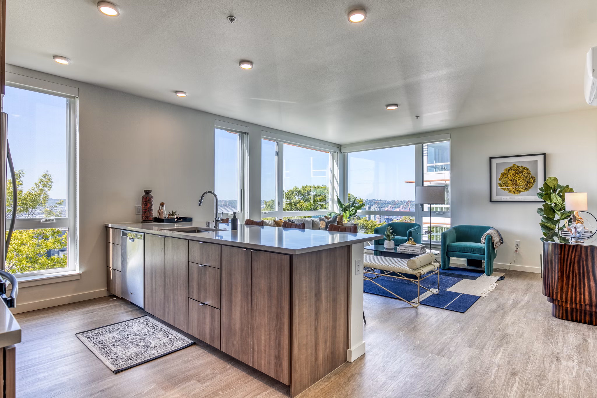 Elegant dining room with stylish decor at Cypress Apartments featuring a large wooden table and modern lighting fixtures