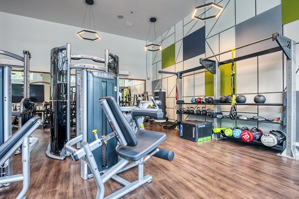 Fitness center with modern equipment at Cypress Apartments