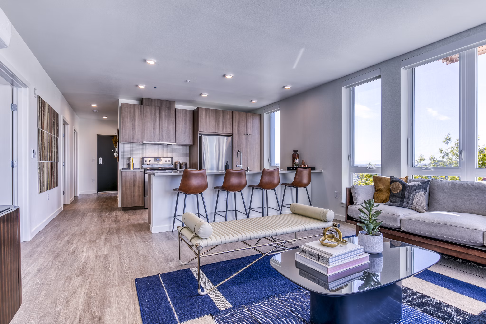 Contemporary living room with natural light at Cypress Apartments