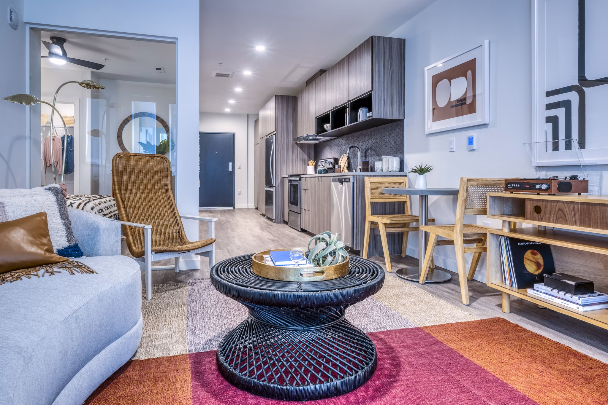 Spacious living room with modern furnishings in Cypress Apartments, a Greystar luxury property