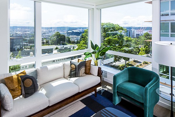 Spacious living room with modern decor in Cypress Apartments, highlighting comfort and style in luxury living