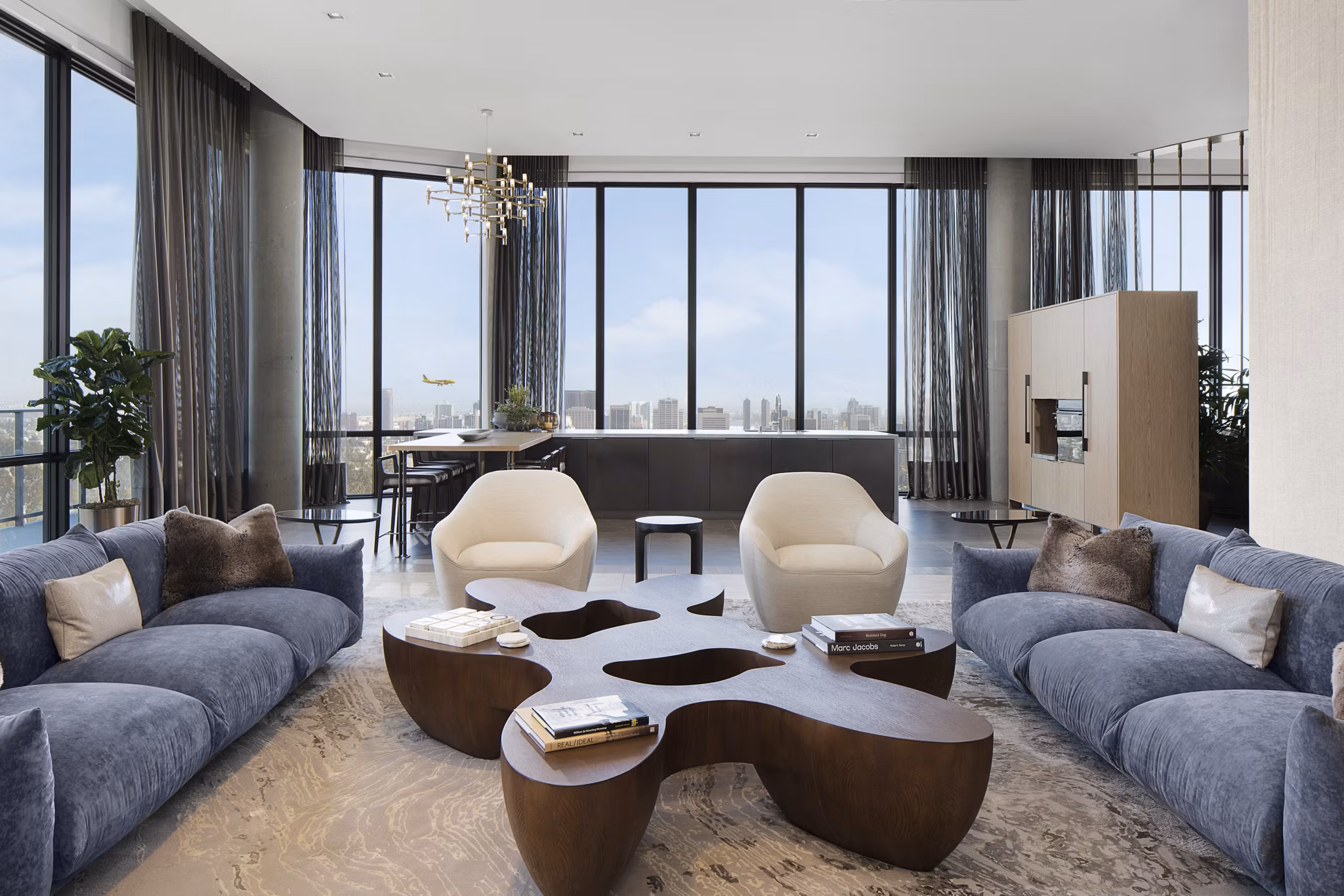 Clubhouse featuring modern design and ample seating at 525 Olive Apartments, a luxury Greystar community in the heart of San Diego