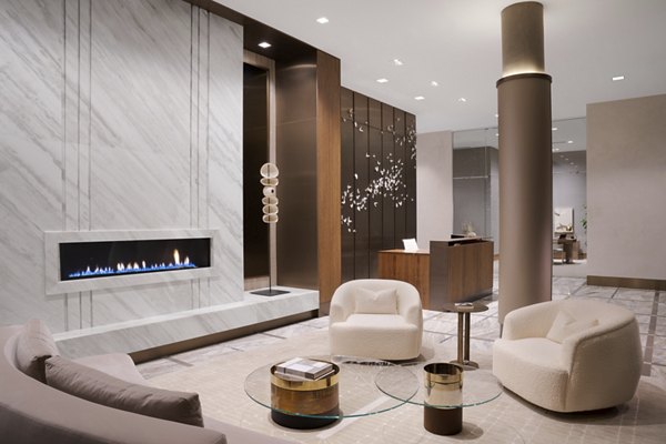 Elegant clubhouse with modern decor at 525 Olive Apartments, ideal for social gatherings and community events