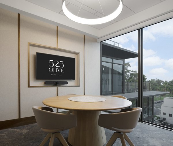 Modern meeting facility with advanced technology at 525 Olive Apartments, offering luxury amenities in an elegant Greystar community