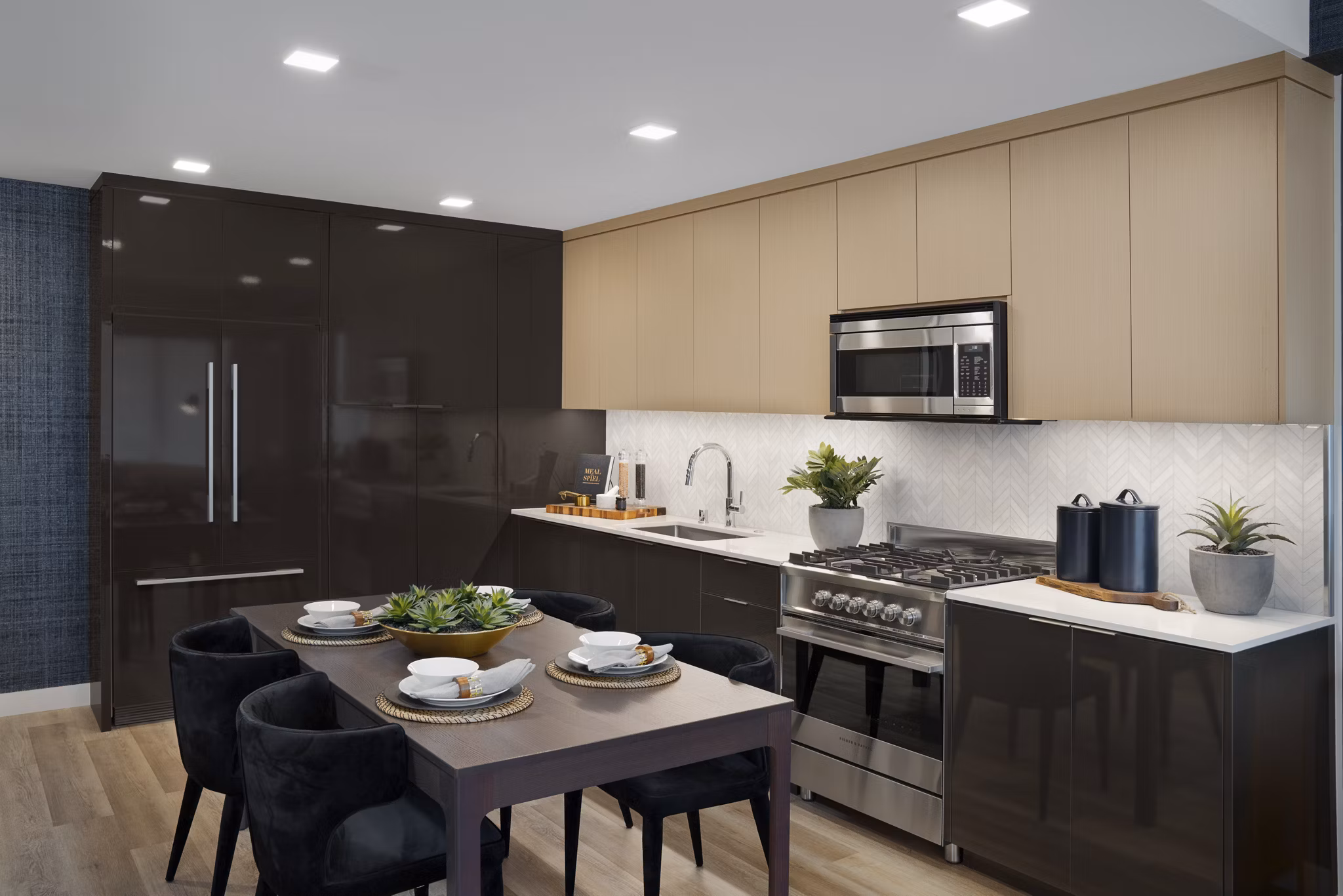 Elegant dining area with modern furnishings at 525 Olive Apartments in downtown, showcasing luxury urban living