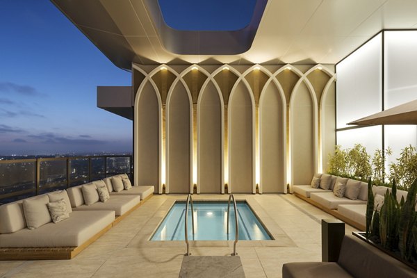 Luxurious rooftop pool with scenic views at 525 Olive Apartments, a Greystar luxury apartment community