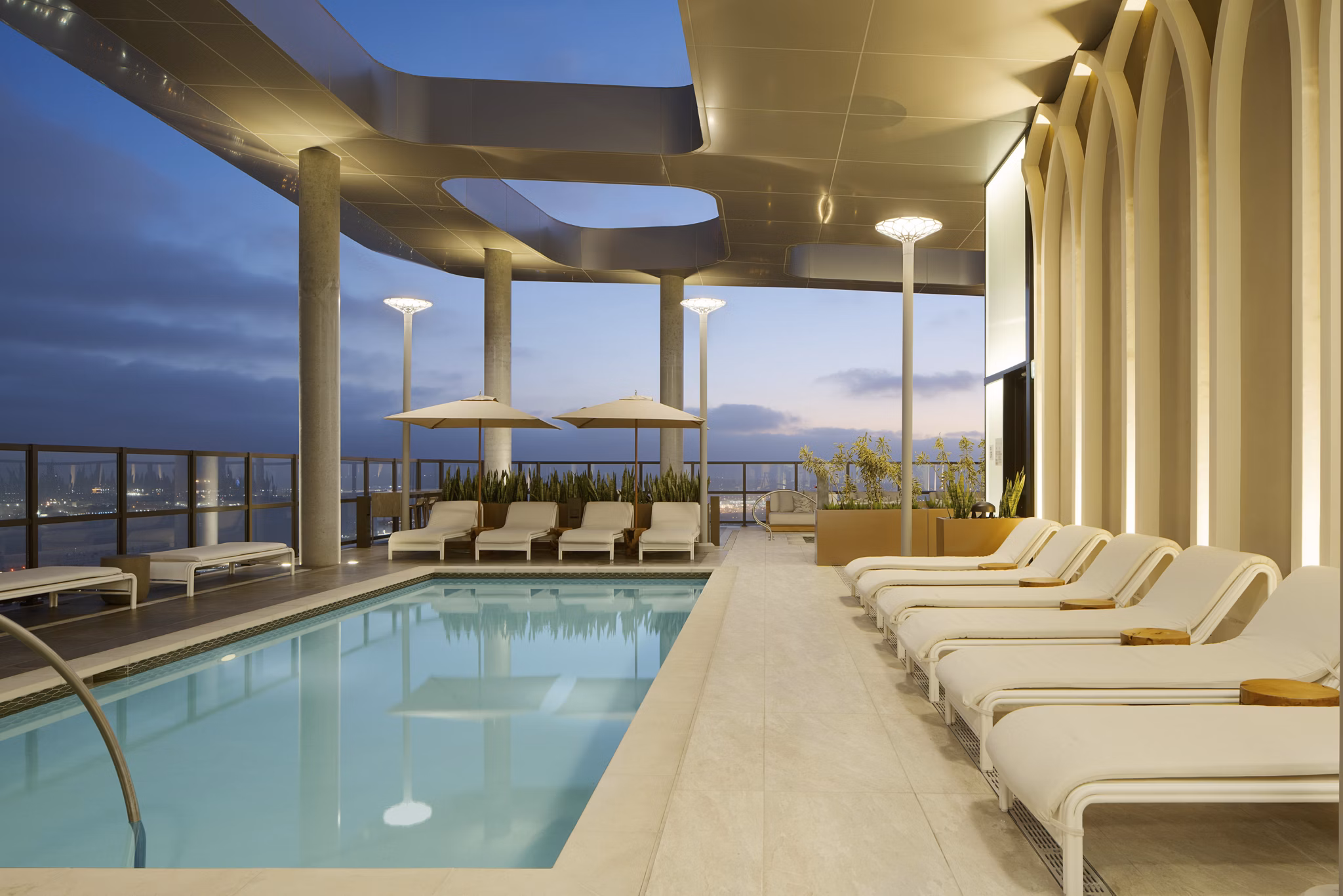Rooftop pool with stunning city views at 525 Olive Apartments, a luxury residence by Greystar