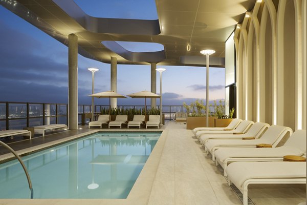 Rooftop pool with stunning city views at 525 Olive Apartments, a luxury residence by Greystar