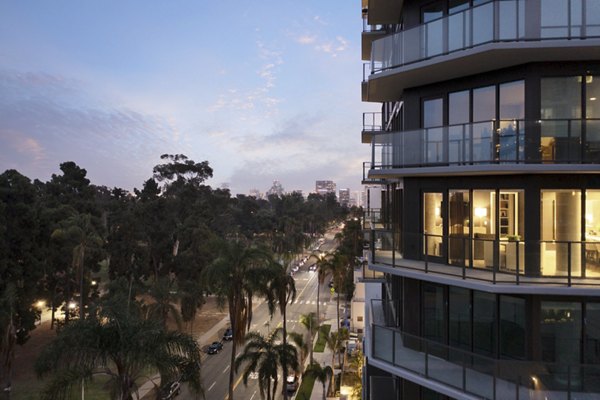 Panoramic city view from rooftop terrace at luxury 525 Olive Apartments