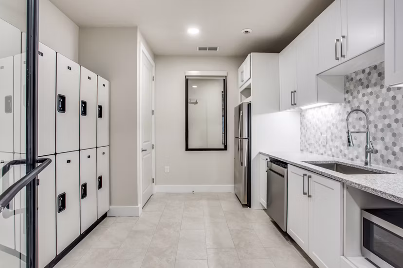 Clubhouse with modern dÃ©cor and seating at Quest Apartments, offering luxury living in a vibrant community