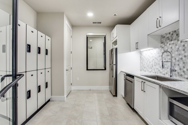 Clubhouse with modern dÃ©cor and seating at Quest Apartments, offering luxury living in a vibrant community