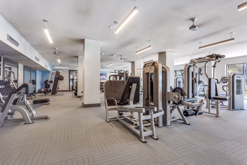 State-of-the-art fitness center with modern equipment at Quest Apartments for an active lifestyle