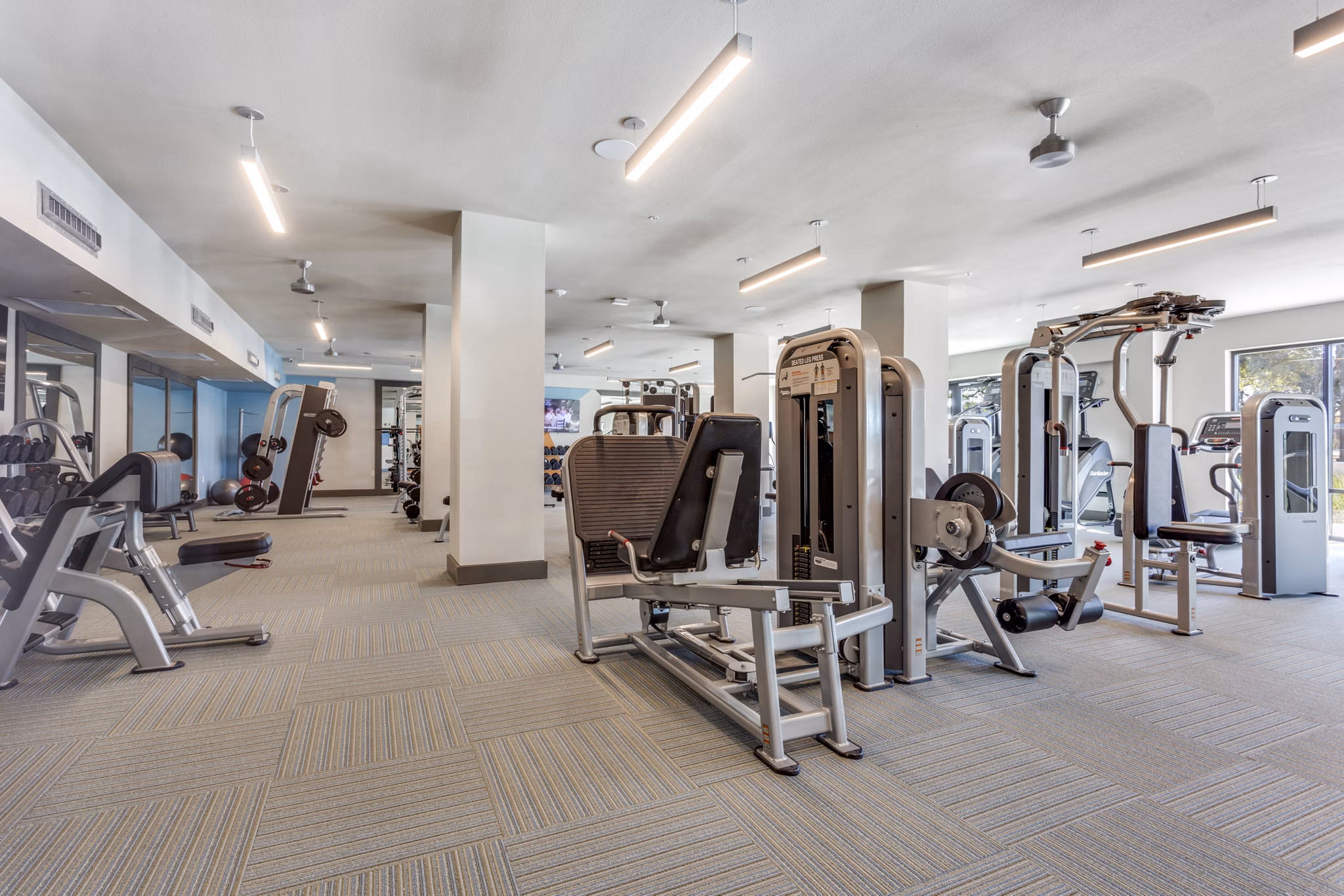 State-of-the-art fitness center with modern equipment at Quest Apartments for an active lifestyle