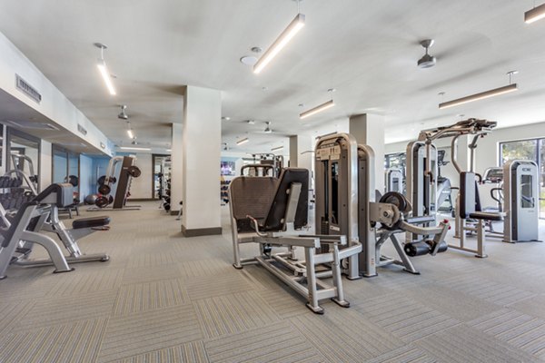 State-of-the-art fitness center with modern equipment at Quest Apartments for an active lifestyle