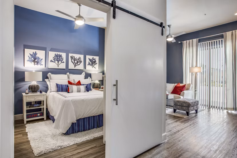 Spacious dining area with modern furnishings at Quest Apartments