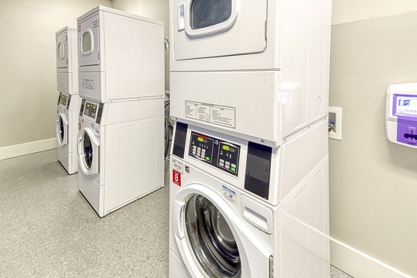 laundry room at 100 Midtown Apartments