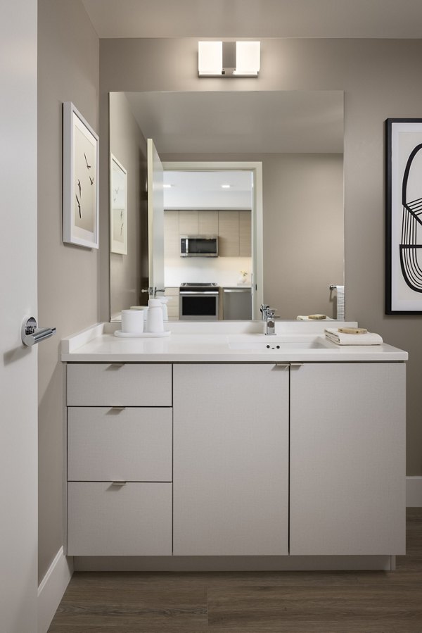 Bathroom featuring sleek fixtures and modern design in Diega Apartments, luxury living spaces in downtown San Diego