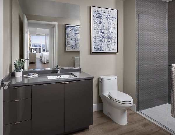 Luxurious bathroom featuring modern fixtures at Diega Apartments in downtown San Diego
