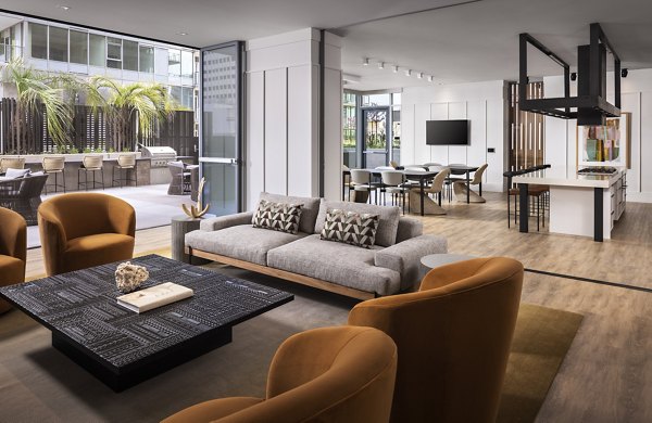 Clubhouse featuring modern design and lounge area at Diega Apartments