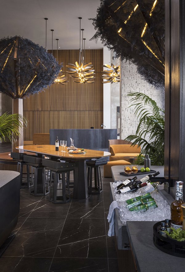 Diega Apartments: Stylish clubhouse with modern decor and seating areas, perfect for relaxing and social gatherings