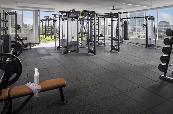 State-of-the-art fitness center with cardio and strength equipment at Diega Apartments
