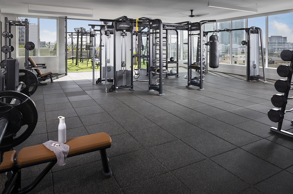 State-of-the-art fitness center with cardio and strength equipment at Diega Apartments