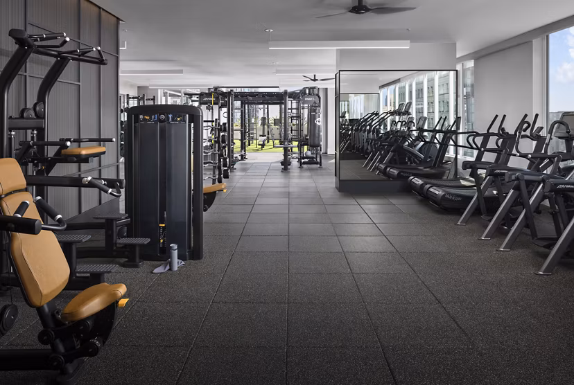 Modern fitness center with state-of-the-art equipment at Diega Apartments for luxury living