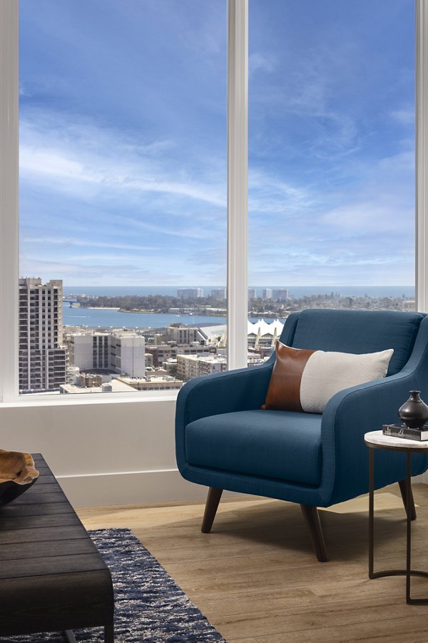 Modern living room with sleek furnishings at Diega Apartments, showcasing contemporary design and comfort in a prime location
