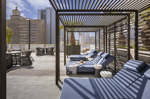 Diega Apartments: Modern patio with stylish furnishings in luxury apartment complex